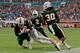 Michael Jackson (28) intercepts an Eric Dungey pass