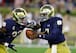 Josh Adams and Brandon Wimbush