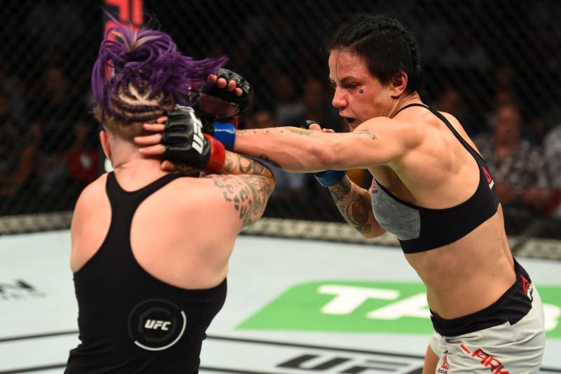 Jessica-Rose Clark (right) punches Bec Rawlings