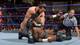Tony Nese keeping Cedric Alexander grounded in a headlock.