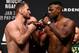 Stipe Miocic (left) and Francis Ngannou.