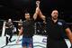 Luke Rockhold (center)