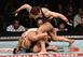 Cris Cyborg (above) punches Yana Kunitskaya.