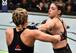 Mackenzie Dern (right) hits Ashley Yoder.
