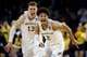 Jordan Poole (2) and Moritz Wagner (13)