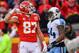 KANSAS CITY, MO - JANUARY 6: Tight end Travis Kelce #87 of the Kansas City Chiefs flexes his muscle after a touchdown catch beyond the coverage of inside linebacker Avery Williamson #54 of the Tennessee Titans during the first quarter of the AFC Wild Card