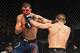 Darren Elkins (left) and Alexander Volkanovski