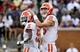 Travis Etienne (9) and Trevor Lawrence (16)