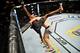 Tim Means (right) takes down Ricky Rainey en route to Friday's TKO victory.