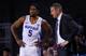 Buffalo's CJ Massinburg (5) and Nate Oats