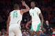 Oregon's Bol Bol (1) and Kenny Wooten (14)