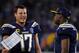 Los Angeles Chargers quarterbacks Philip Rivers (left) and Geno Smith (right)