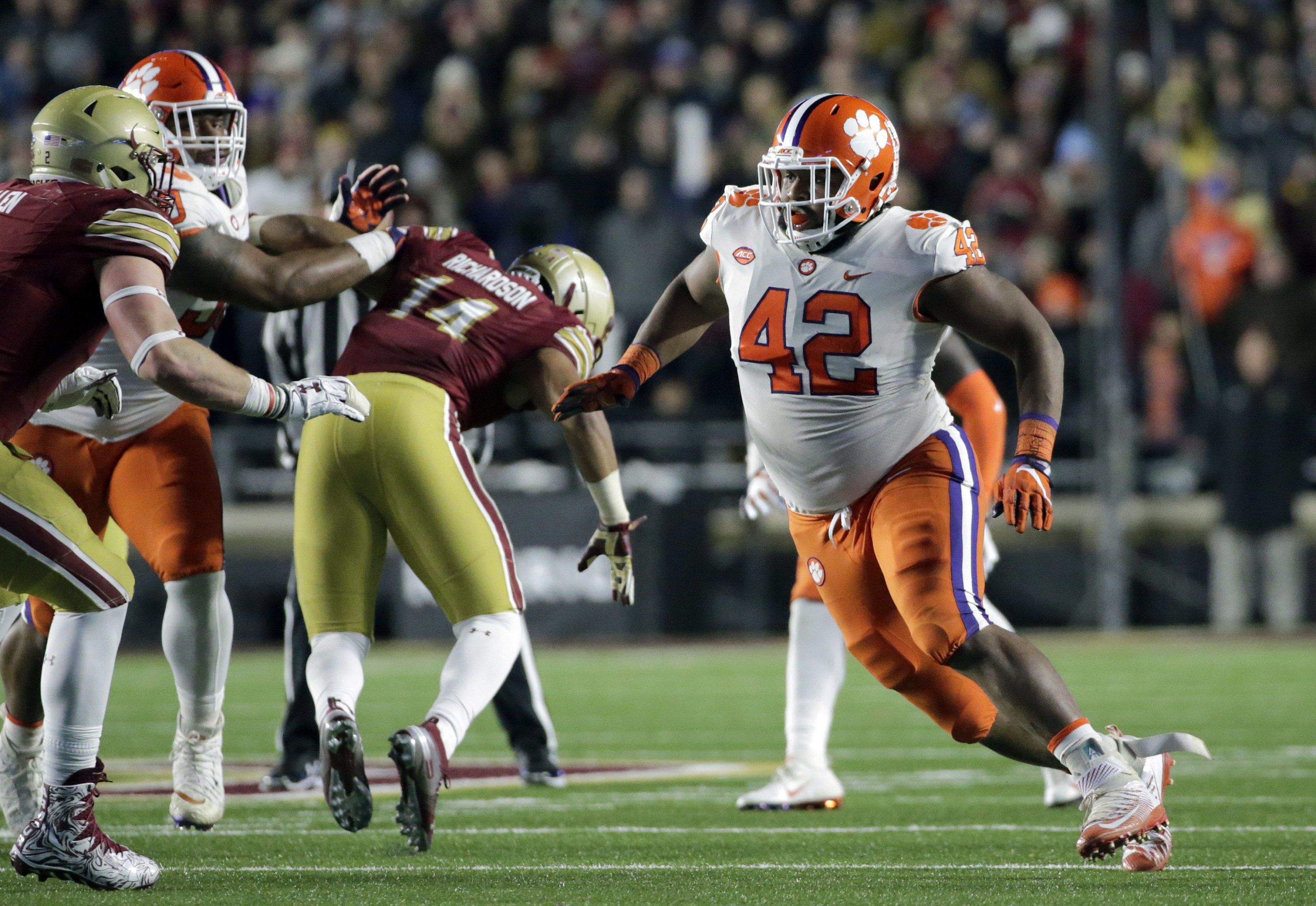 North defensive end John Cominsky of Charleston (5) tries to get around  South offensive tackle Dennis Daley of South Carolina (78) during the  second half of the Senior Bowl college football game