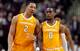 Tennessee's Grant Williams (2) and Jordan Bone (0)