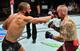 John Makdessi (left) hits Ross Pearson