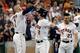 Carlos Correa (L), Alex Bregman (C) and Jose Altuve (R)