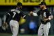Tim Anderson (L) and Yoan Moncada (R)