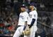Manny Machado (L) and Fernando Tatis Jr. (R)