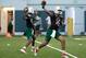 Miami's N'Kosi Perry (5) and Jarren Williams (15)