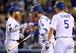 Justin Turner (L), Cody Bellinger (C) and Corey Seager (R)