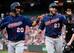 Eddie Rosario (L) and Nelson Cruz (R)
