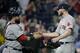 Sandy Leon (L) and Chris Sale (R)