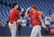 Shohei Ohtani (L) and Mike Trout (R)