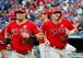 Kole Calhoun (L) and Mike Trout (R)