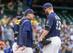 Craig Counsell (L) and Jimmy Nelson (R)