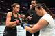 Joanna Jedrzejczyk (left) and Michelle Waterson.