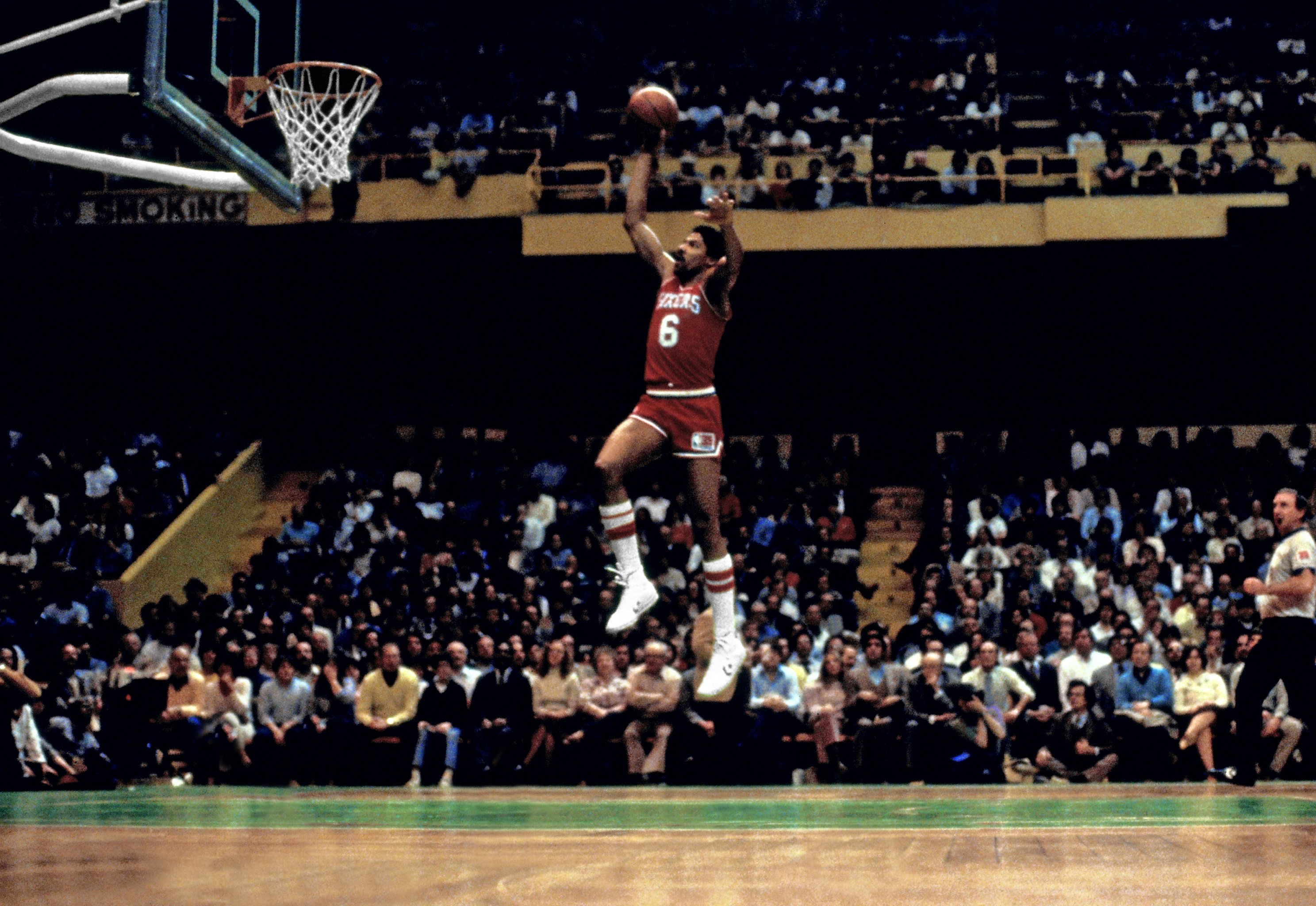Download Michael Jordan in midair during a gravity-defying dunk