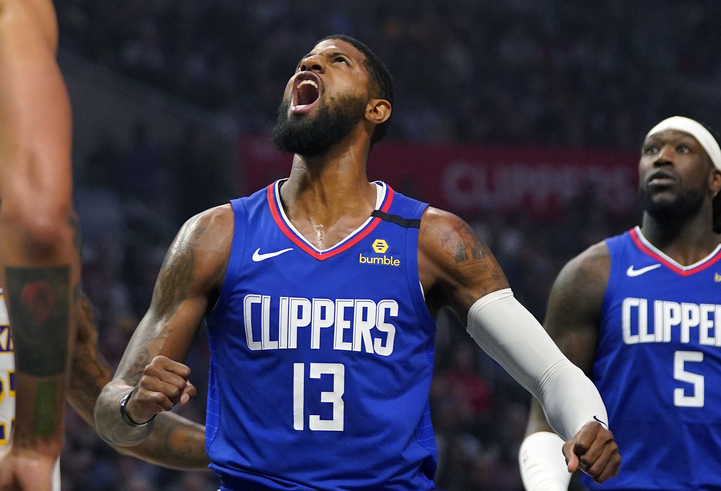 Blake Griffin elevates for a jumper in red Clipper jersey - Clippers News  Surge NBA Gallery - Los Angeles Clippers Pictures & Photos