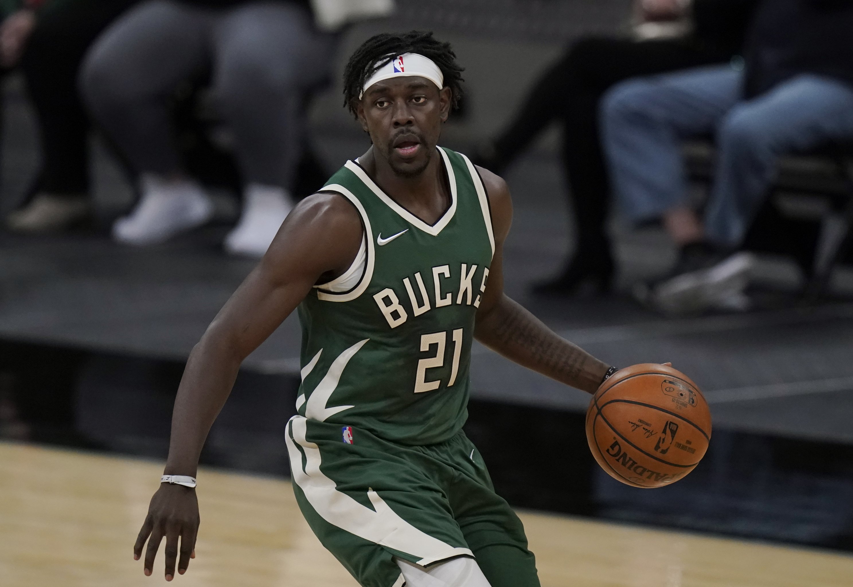 Title Hunting: Can the Bucks' Jrue Holiday Succeed in the Playoffs Where  Eric Bledsoe Failed?