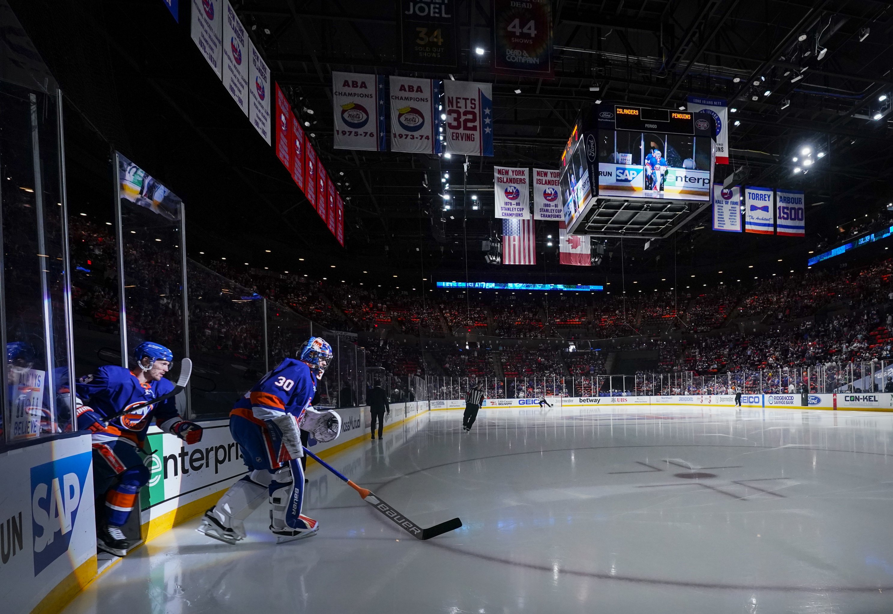 People consider merchandise while shopping at the team store Ball Arena,  Monday, June 27, 2022, in Denver after the Colorado Avalanche defeated the Tampa  Bay Lightning in Game 6 of the Stanley