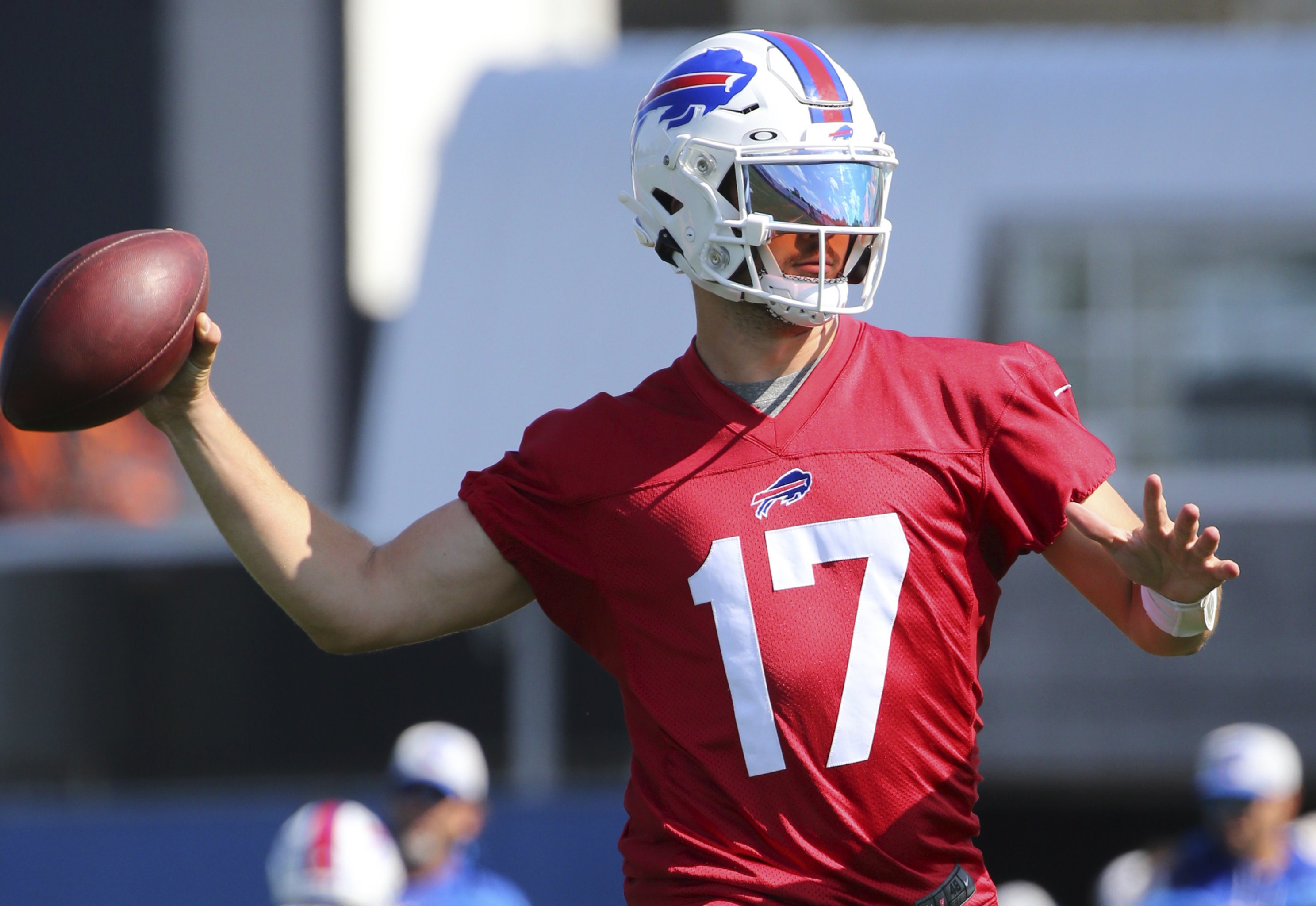 Josh Allen with a blue helmet at the blue and red practice right