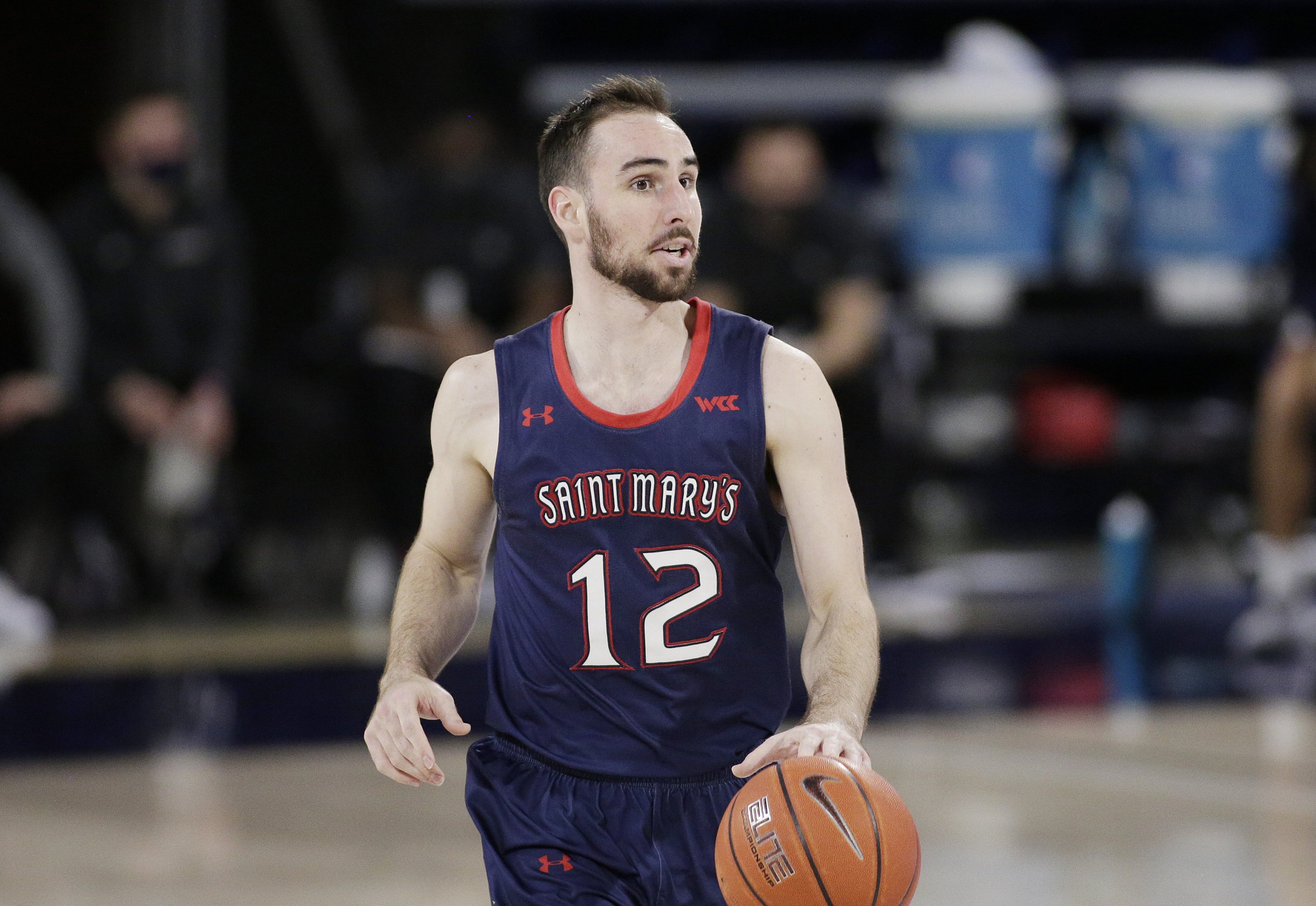 Johnson scores 27 to lead No. 17 Saint Mary's past BYU 71-65