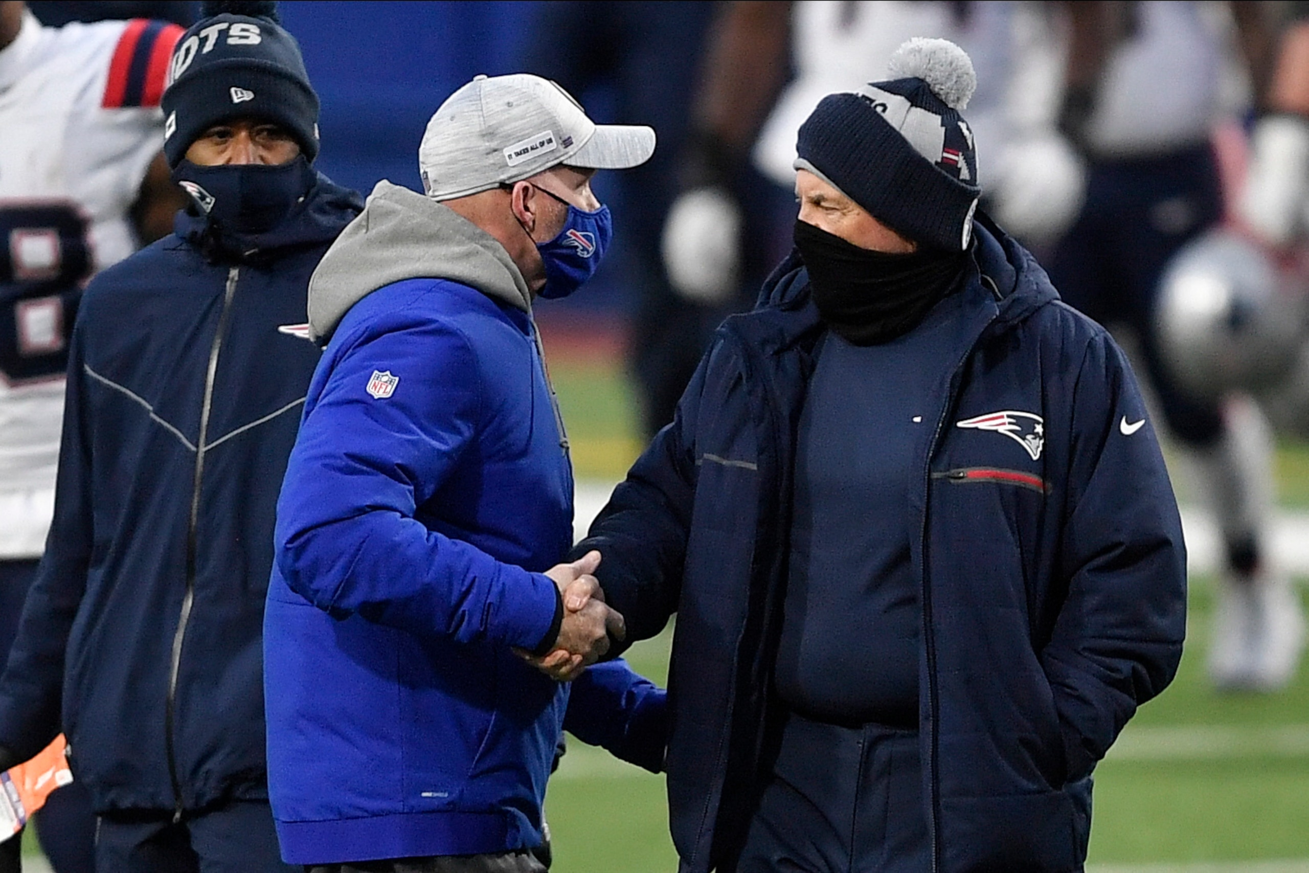 Bills head coach Sean McDermott (left) and Patriots head coach Bill Belichick (right)