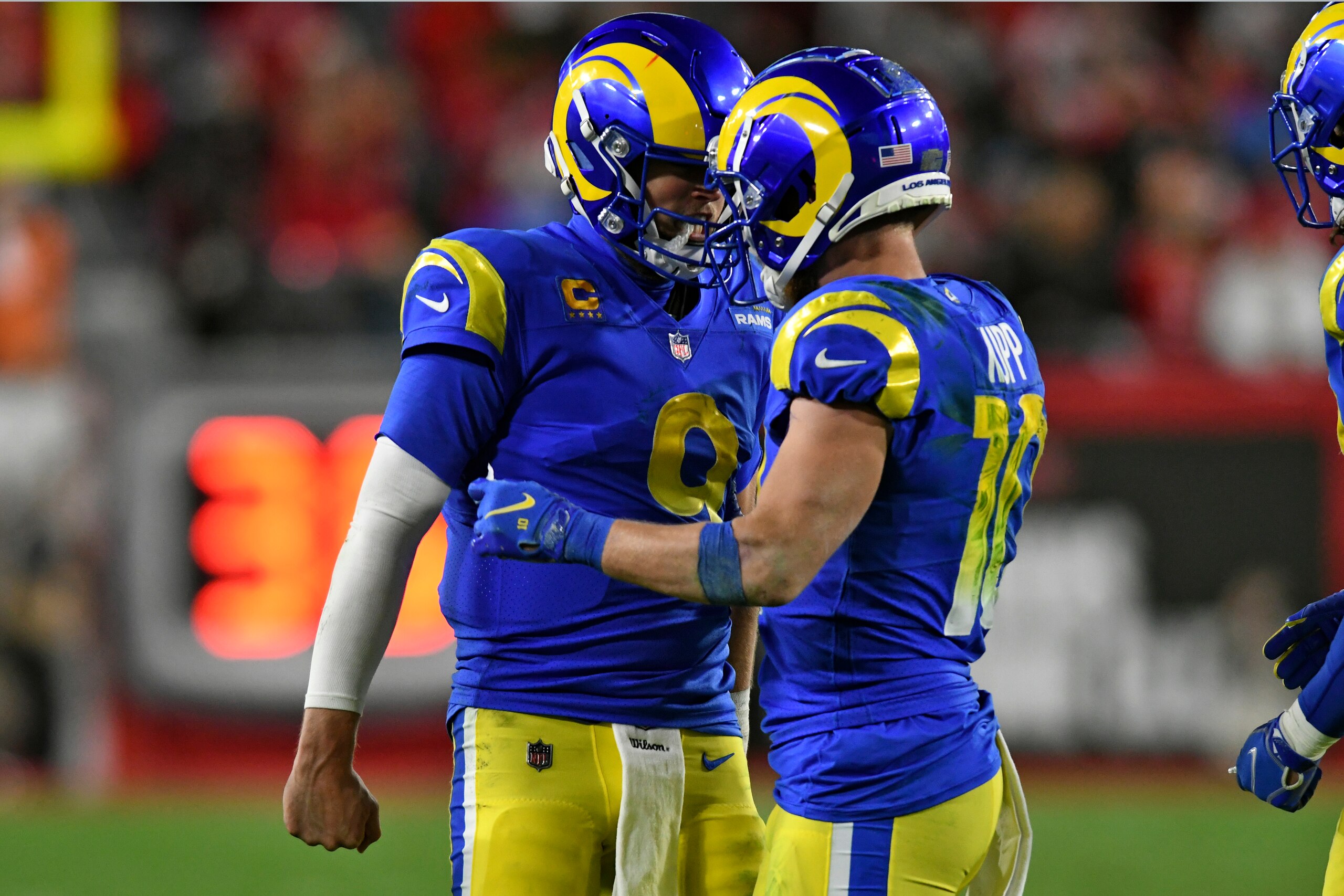 Rams quarterback Matthew Stafford (left) and wide receiver Cooper Kupp (right)