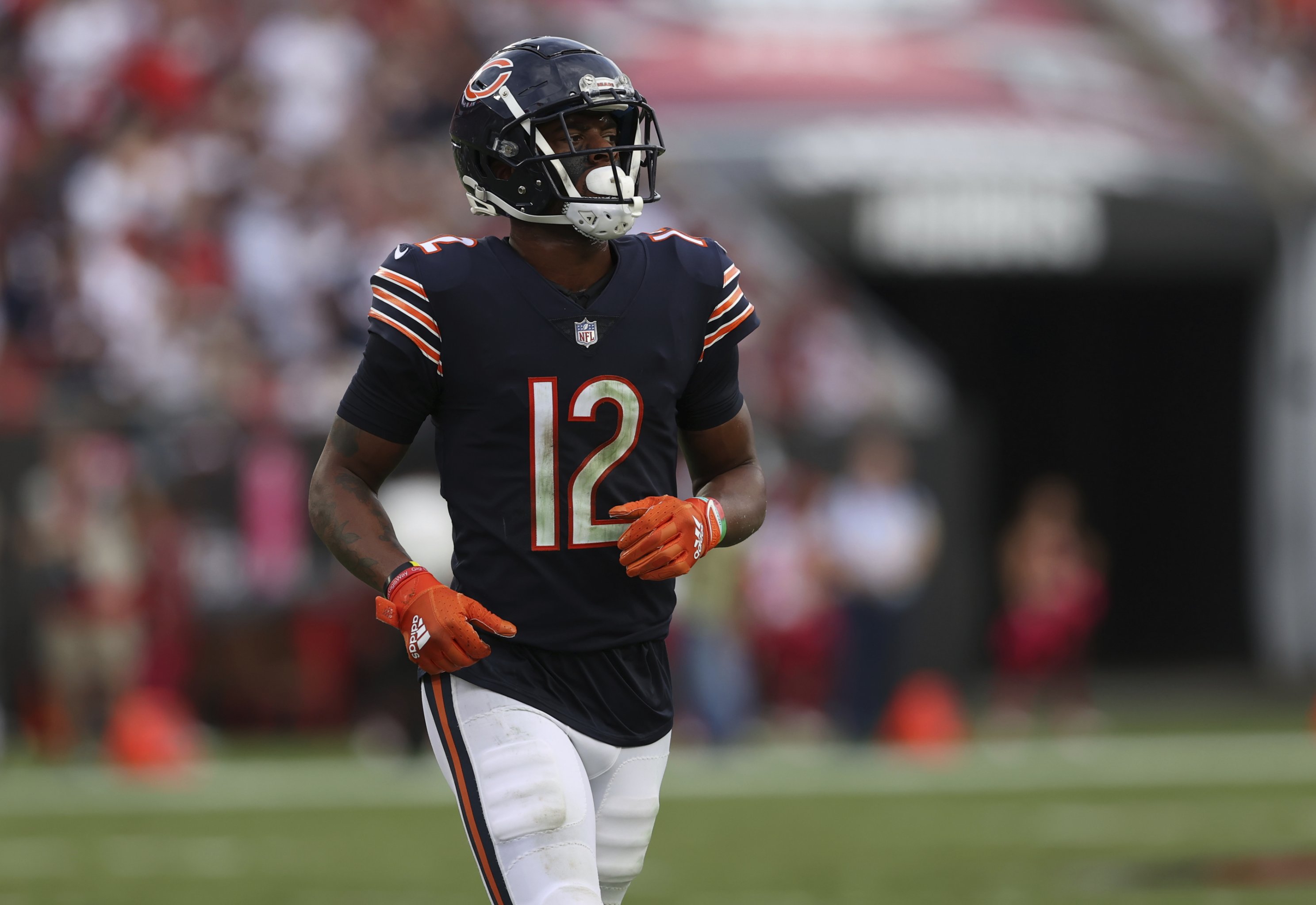 Allen Robinson II of the Chicago Bears runs with a pass during the