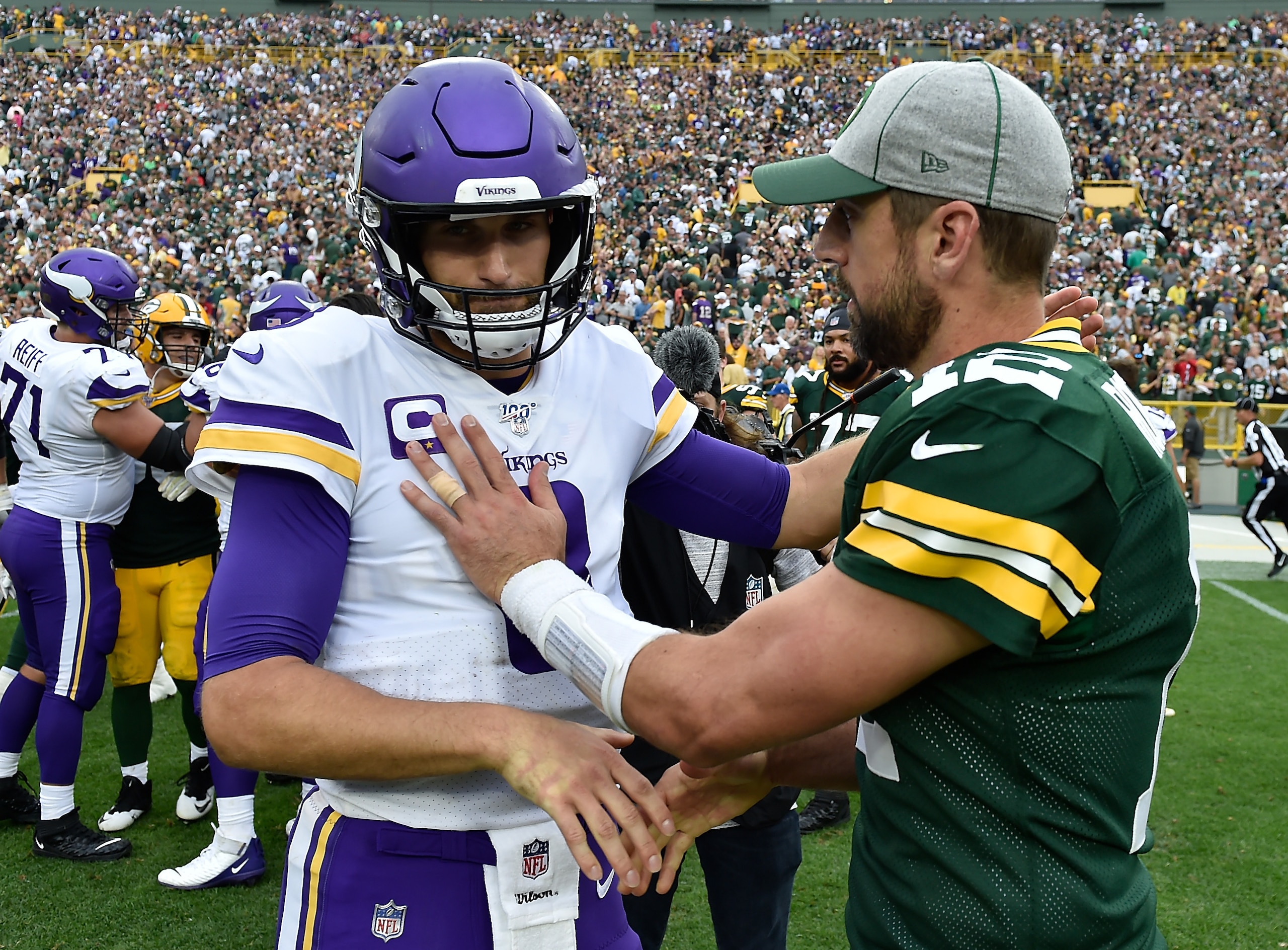 Minnesota Vikings QB Kirk Cousins (left) and Green Bay Packers QB Aaron Rodgers (right)