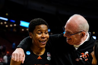 Miami's Charlie Moore and Jim Larranaga