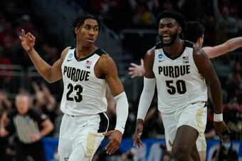 Purdue's Jaden Ivey (23) and Trevion Williams (50)